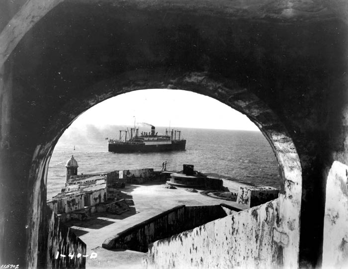 U.S.A. transport, "American Legion" entering San Juan Bay (part of El Morro Castle in foreground). 1940.  SC 115702